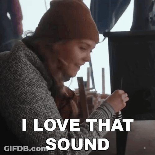 Woman Says I Love That Sound Holding Pen GIF