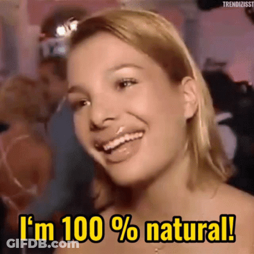Woman Says I'm 100% Natural And Smiles GIF