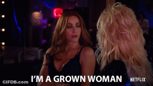Woman Says I'm A Grown Woman In Front Of Neon Sign GIF