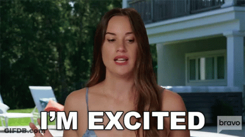 Woman Says I'm Excited In Front Of Large House GIF