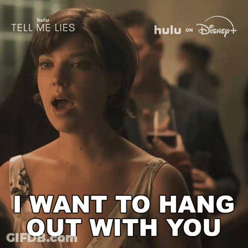 Woman Says I Want To Hang Out With You In Front Of Tell Me Lies Sign GIF