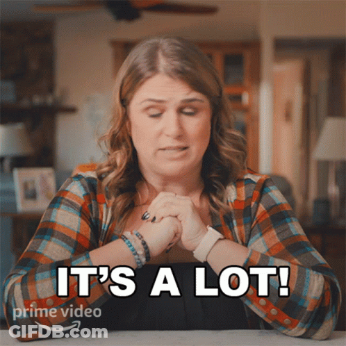 Woman Says It's A Lot In Front Of Picture Of Her GIF