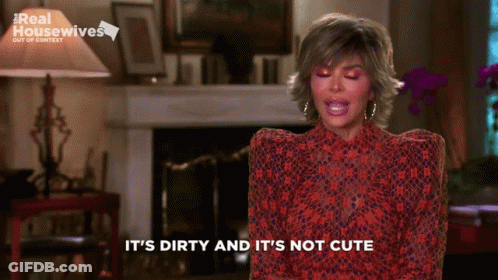 Woman Says It's Dirty And It's Not Cute In Front Of Fireplace GIF