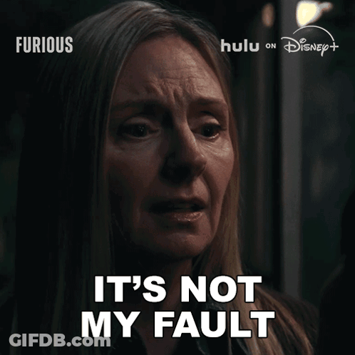 Woman Says It's Not My Fault In Dark Room GIF