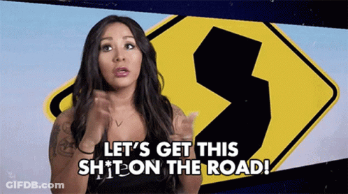 Woman Says Let's Get This Shit On The Road In Front Of Sign GIF