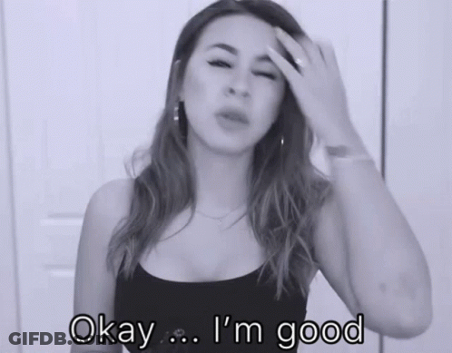 Woman Says Okay I'm Good Holding Her Head GIF