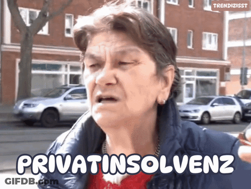 Woman Says Privatinsolvenz In Front Of Brick Building GIF