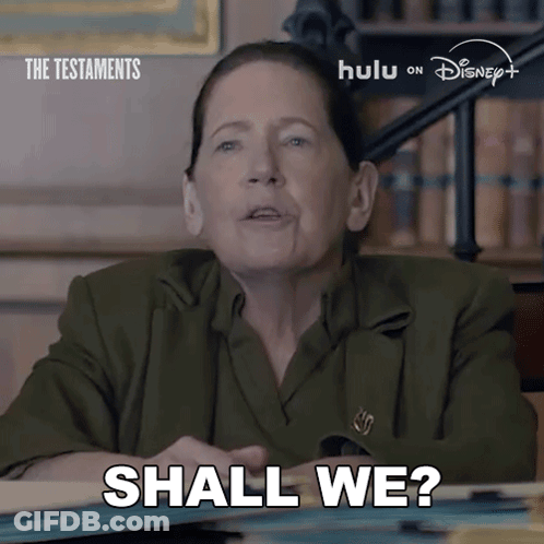 Woman Says Shall We With The Testaments Sign GIF