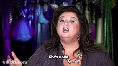 Woman Says She's A Star Wearing Necklace GIF