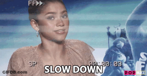 Woman Says Slow Down In Front Of Frozen Poster GIF