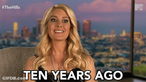 Woman Says Ten Years Ago In Front Of Cityscape GIF