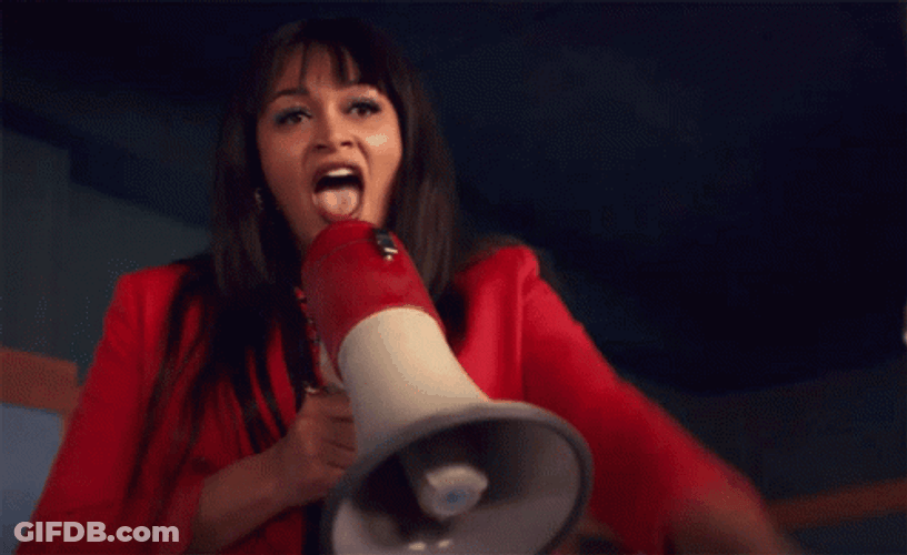 Woman Says Tes On A Megaphone GIF