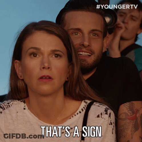Woman Says That's A Sign Man Looks On GIF