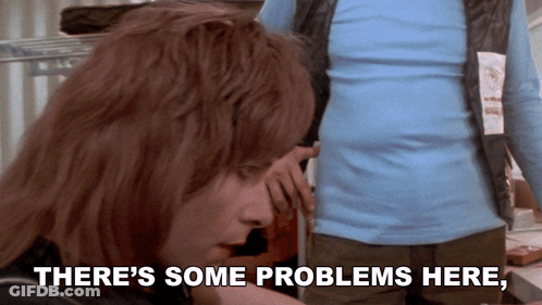Woman Says There's Some Problems Here To Man In Blue Shirt GIF