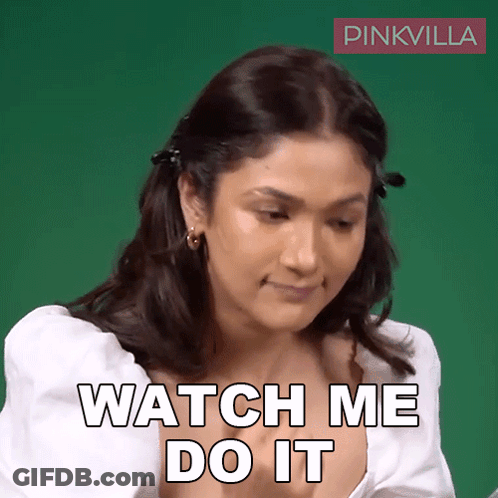 Woman Says Watch Me Do It In Front Of Pinkvilla Logo GIF