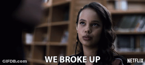 Woman Says We Broke Up In Front Of Netflix Sign GIF