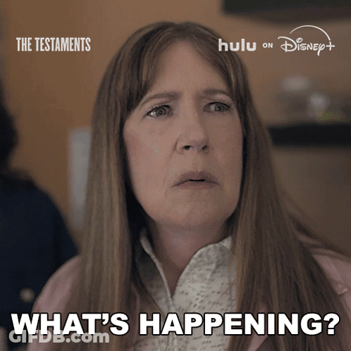 Woman Says What's Happening In Front Of Hulu On Disney Sign GIF