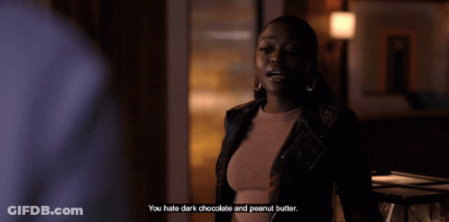 Woman Says You Hate Dark Chocolate And Peanut Butter In Dark Room GIF