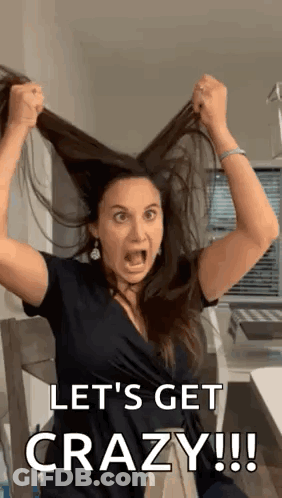 Woman Screaming And Holding Hair GIF