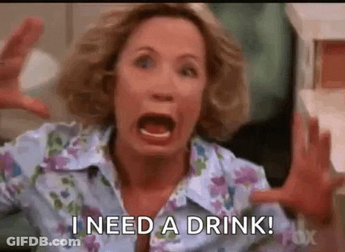 Woman Screaming Hands Up Saying I Need A Drink GIF