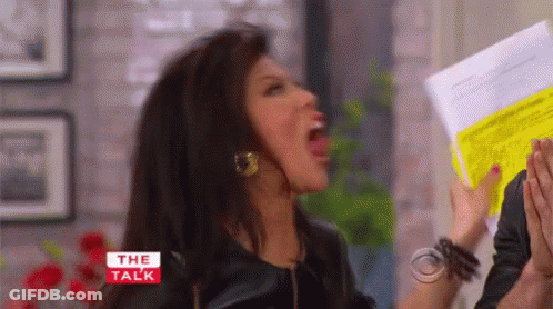 Woman Screaming Holding Paper GIF