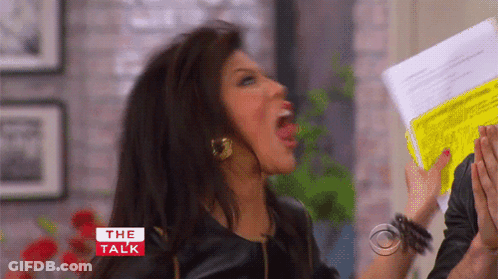 Woman Screaming Holding Paper Saying The Talk GIF
