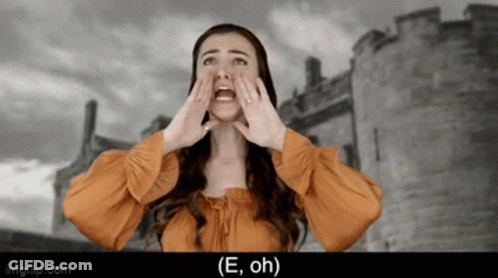 Woman Screaming In Front Of Castle Saying E Oh GIF