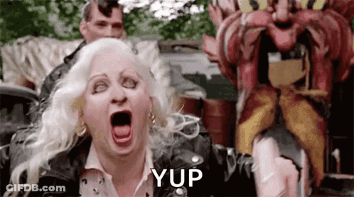 Woman Screaming In Front Of Statue GIF