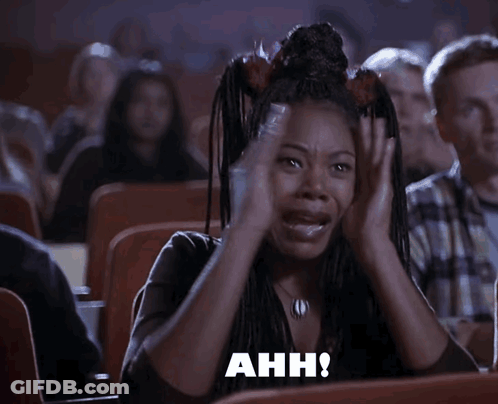 Woman Screaming In Theater Saying Ahh GIF