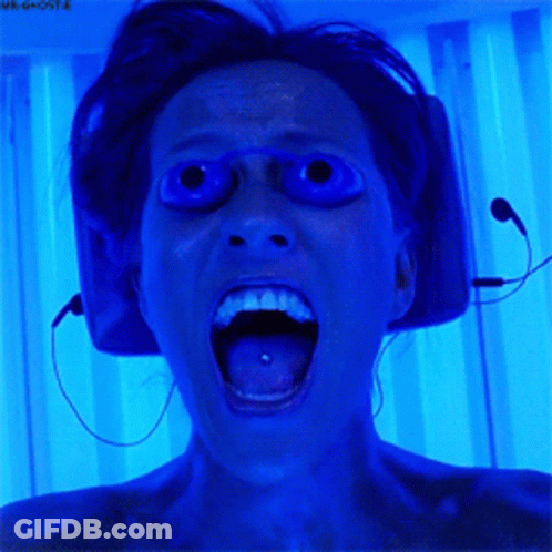 Woman Screaming Into Microphone With Headphones GIF