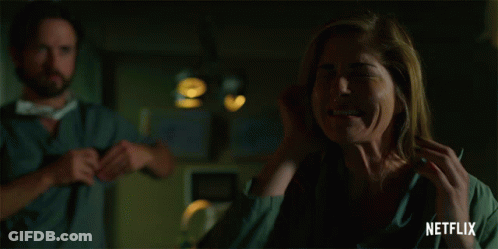 Woman Screaming Man Holds Head Netflix Ad GIF