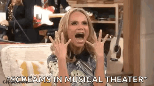 Woman Screaming On Couch In Musical Theater GIF