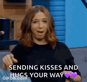 Woman Sending Kisses And Hugs GIF