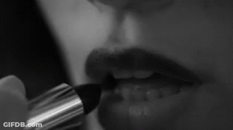 Woman Sensual Putting Lipstick GIF
