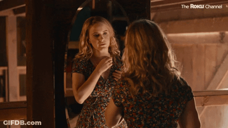 Woman Serious Self Reflection In The Mirror GIF