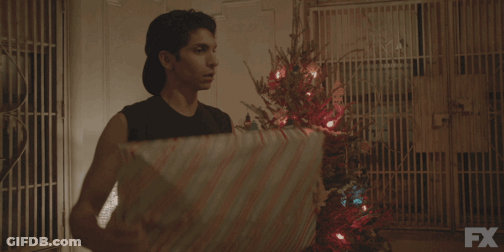 Woman Shaking Gift GIF