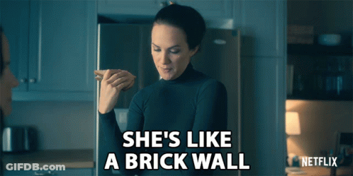 Woman She's Like A Brick Wall GIF