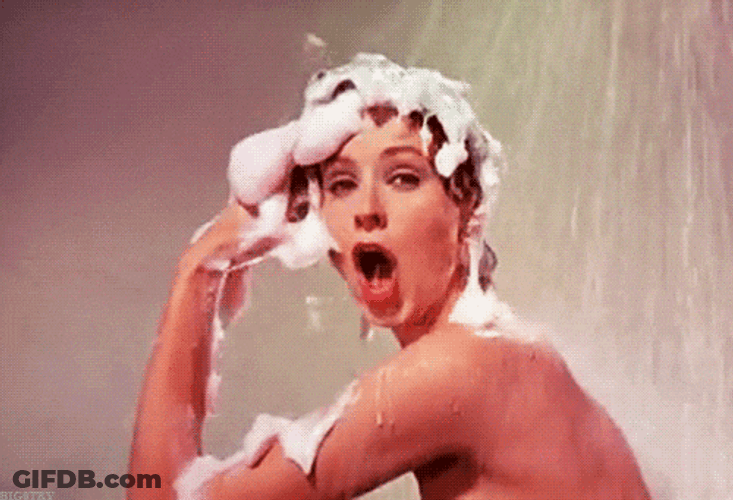 Woman Showering While Sitting GIF