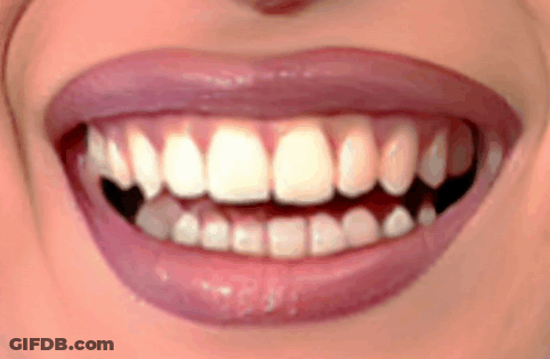 Woman Showing Teeth And Pink Lips GIF