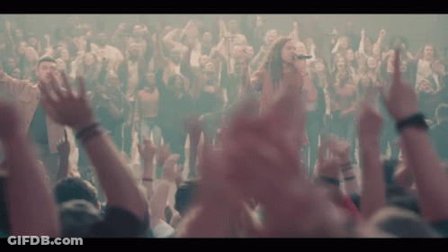 Woman Singing At Concert Crowd Hands Up GIF