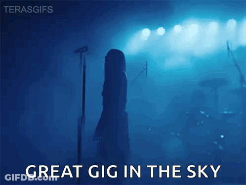 Woman Singing Great Gig In The Sky Into Microphone GIF