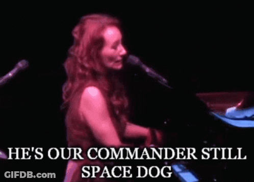Woman Singing He's Our Commander Still Space Dog GIF