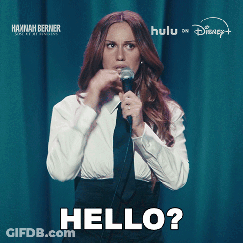 Woman Singing Hello Into Microphone GIF