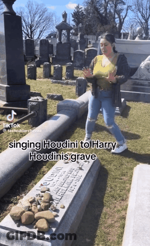 Woman Singing Houdini At Harry Houdini's Grave GIF