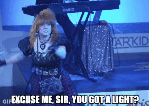 Woman Singing In Front Of Keyboard Says Excuse Me Sir You Got A Light GIF