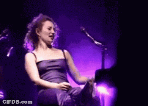 Woman Singing In Purple Dress GIF