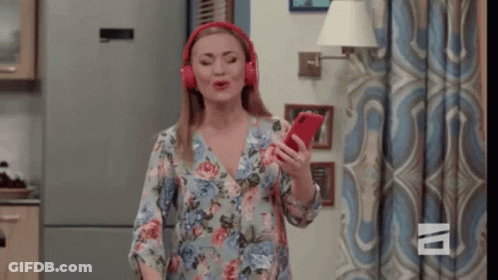 Woman Singing Into Cell Phone GIF