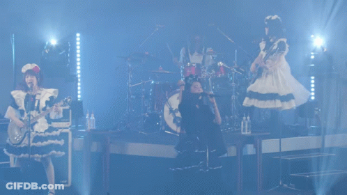 Woman Singing Into Microphone GIF