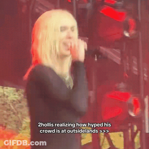 Woman Singing Into Microphone 2Holiis Realizing How Hyped His Crowd Is At Outsidelands GIF