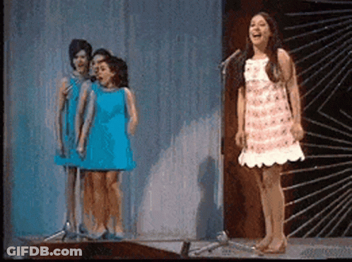 Woman Singing Into Microphone GIF